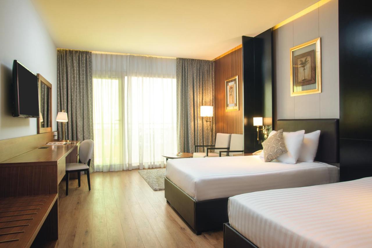 Mövenpick Hotel Cairo - Media City Giza Exteriör bild Deluxe Room