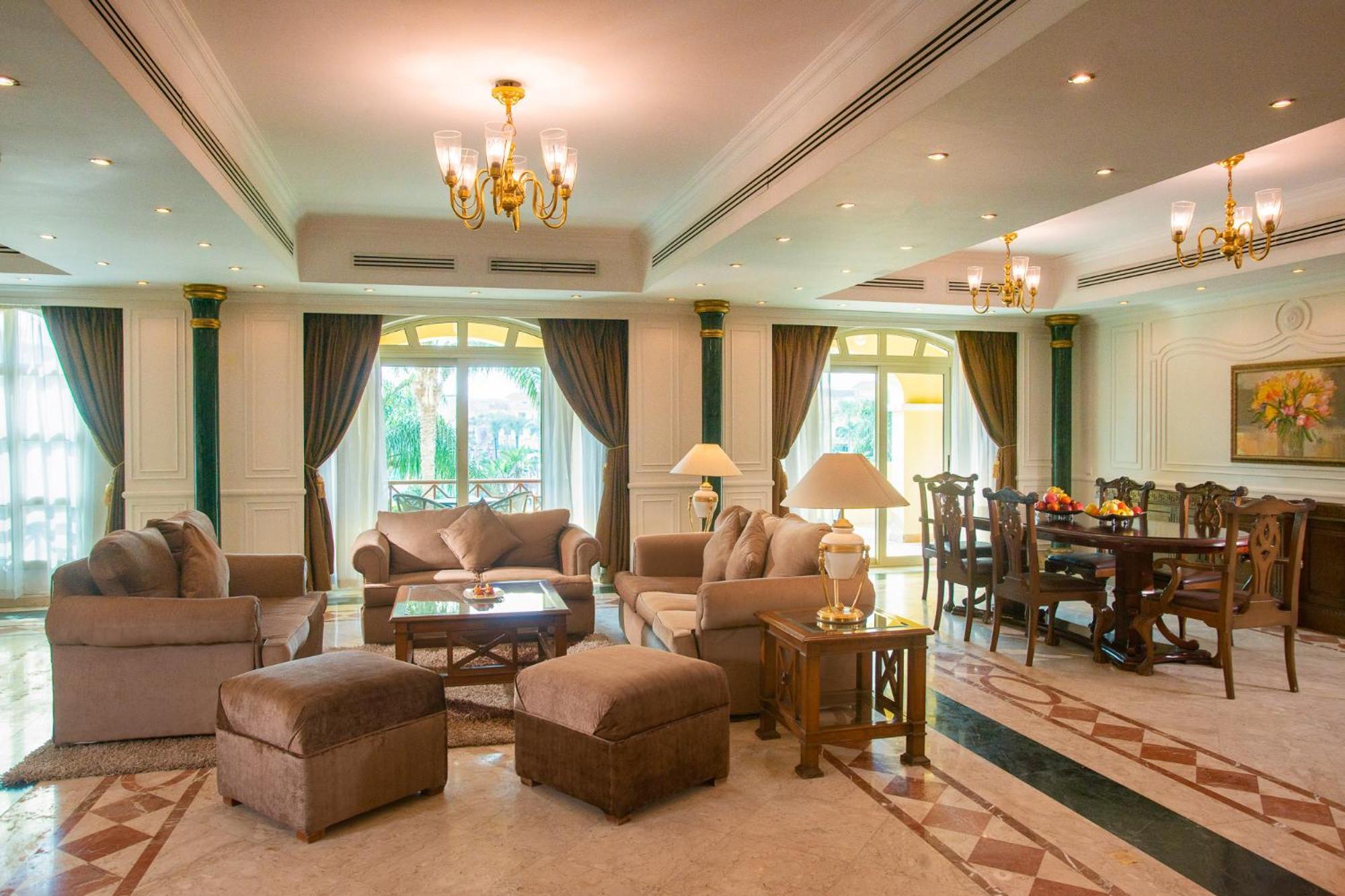 Mövenpick Hotel Cairo - Media City Giza Exteriör bild A living room in a luxury villa